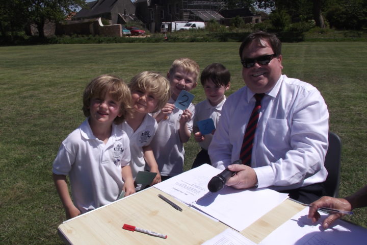Headteacher with students